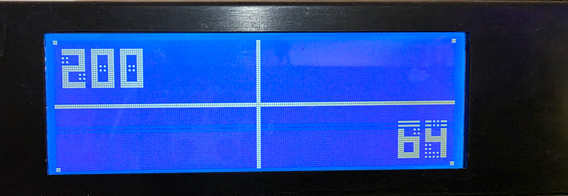 A screenshot of an AlphaCool LCD Display showing some test text indicating the display driver is working correctly